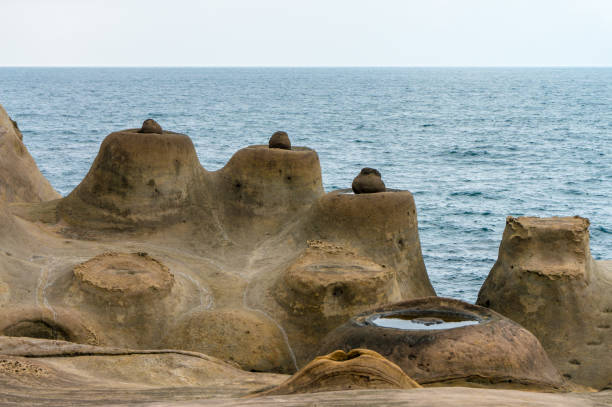 istock Unique geological formations at Yehliu Geopark 1180969520