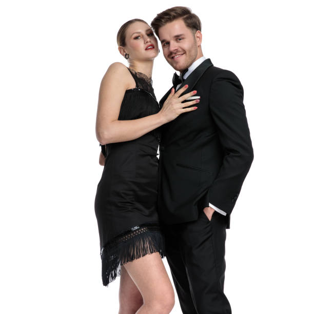istock Seductive girlfriend touching his boyfriend that is embracing her 1180972478