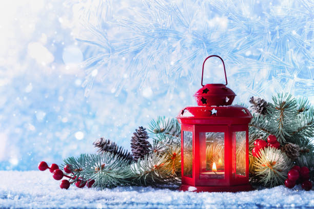 christmas lantern in snow with fir tree branch. winter cozy scene for new year holidays. - non urban scene imagens e fotografias de stock