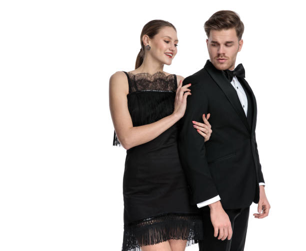 istock Unimpressed boyfriend looking over his shoulder at his lover 1180973094