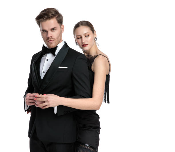 istock Passionate girlfriend embracing his lover and looking away 1180973150