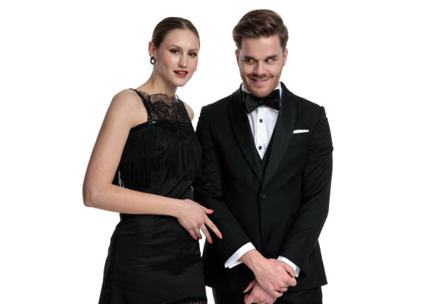 istock Girlfriend posing beside boyfriend that is making a funny face 1180973313
