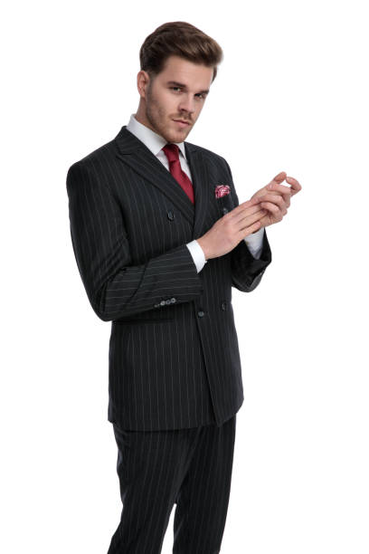 istock elegant businessman wearing double breasted suit and red tie 1180978109