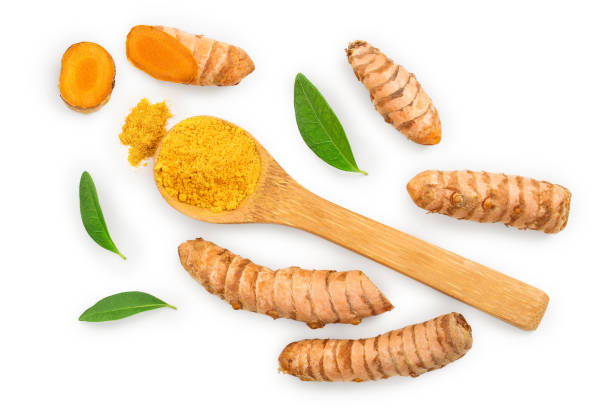istock Turmeric powder and turmeric root isolated on white background. Top view. Flat lay 1180978146