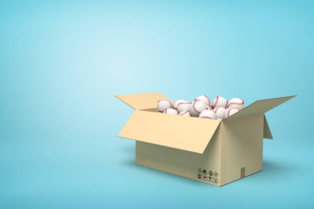 istock 3d rendering of baseballs in carton box on blue background. 1180978313