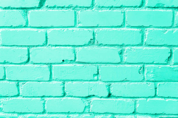 Mint brick wall texture. Background with copy space for design. Biscay Green color of the year 2020