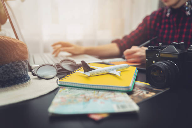 wanderlust - woman planning next journey searching information online