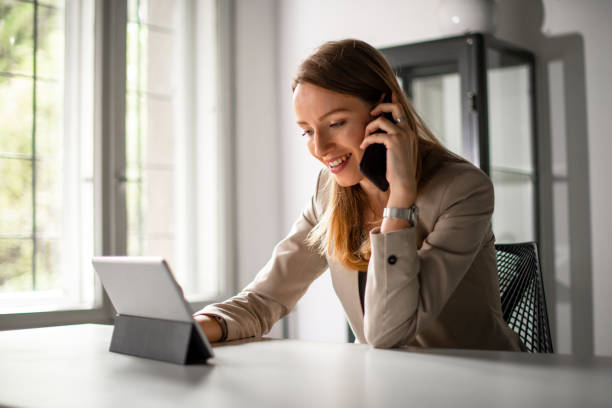 istock Young woman talking on mobile phone 1180980893