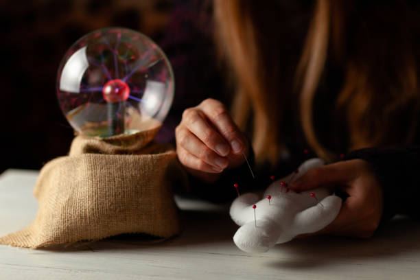 istock Seer with magic ball performs ritual. Psychic vision, fortune teller 1180982278