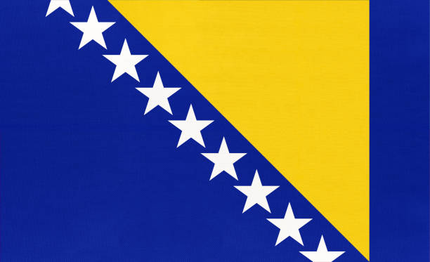 Bosnia and Herzegovina national fabric flag textile background. Bosnia and Herzegovina national fabric flag textile background. Symbol of international world european country. State official europe sign. bosnia and herzegovina stock pictures, royalty-free photos & images