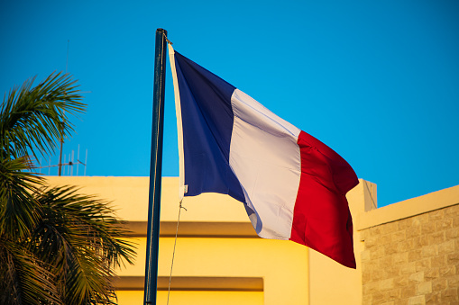 French flag on sky background