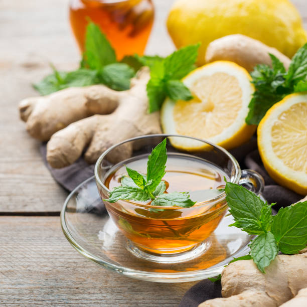 istock Ginger tea with lemon, mint and honey for flu cold 1180989992