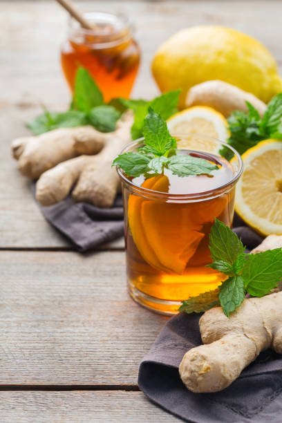 istock Ginger tea with lemon, mint and honey for flu cold 1180990011