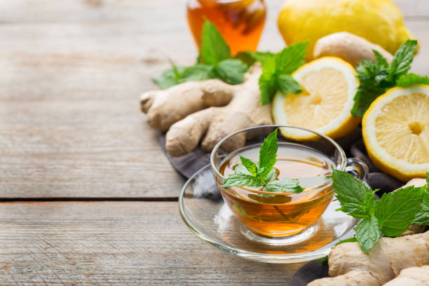 istock Ginger tea with lemon, mint and honey for flu cold 1180990031