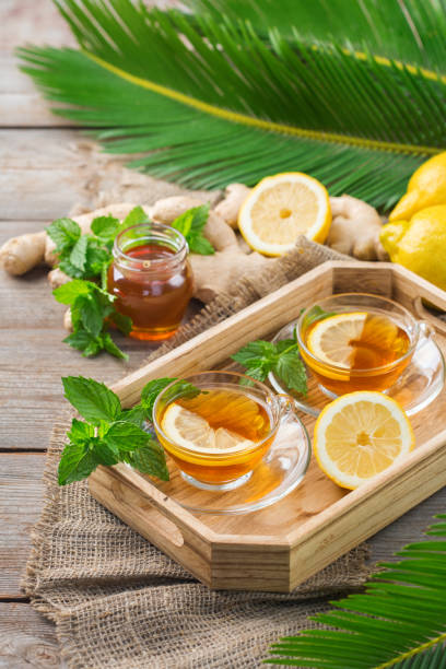 istock Ginger tea with lemon, mint and honey for flu cold 1180990033