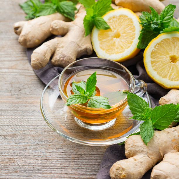 istock Ginger tea with lemon, mint and honey for flu cold 1180990055