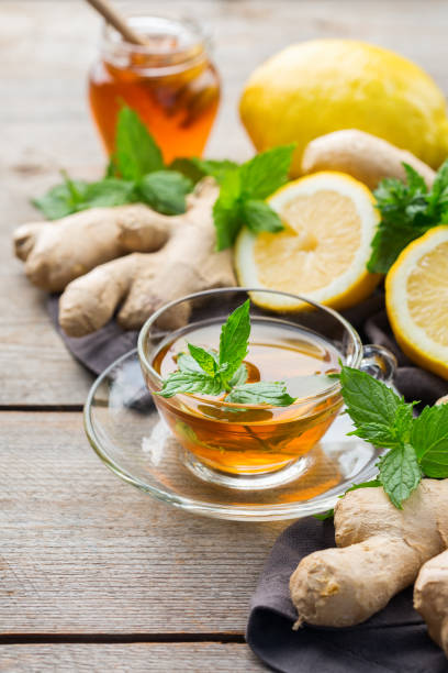 istock Ginger tea with lemon, mint and honey for flu cold 1180990063