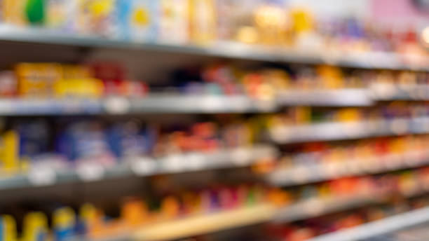 istock Defocused food store shelf with pre-packaged food 1180990084