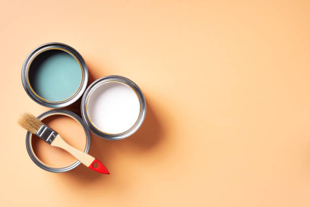 paint brush and open paint can with on pastel background. top view, copy space. appartment renovation, repair, building and home design concept. - tempera painting imagens e fotografias de stock