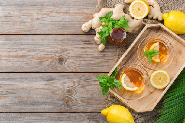 ginger tea with lemon, mint and honey for flu cold - ginger tea cup cold and flu tea imagens e fotografias de stock