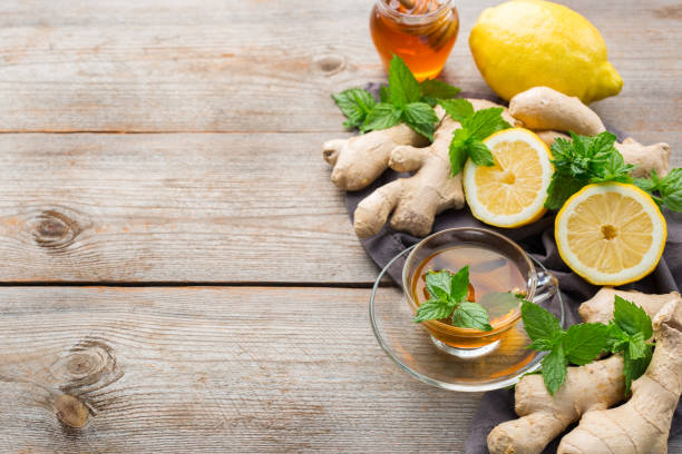 istock Ginger tea with lemon, mint and honey for flu cold 1180990120