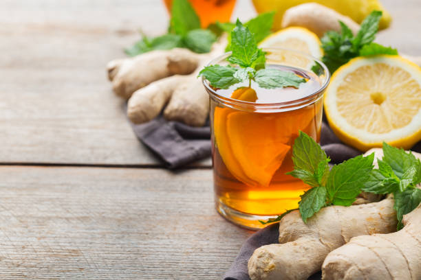 istock Ginger tea with lemon, mint and honey for flu cold 1180990138