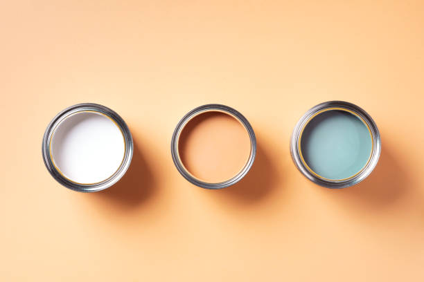 istock Open paint can with on pastel background. Top view, copy space. Appartment renovation, repair, building and home design concept. 1180990139