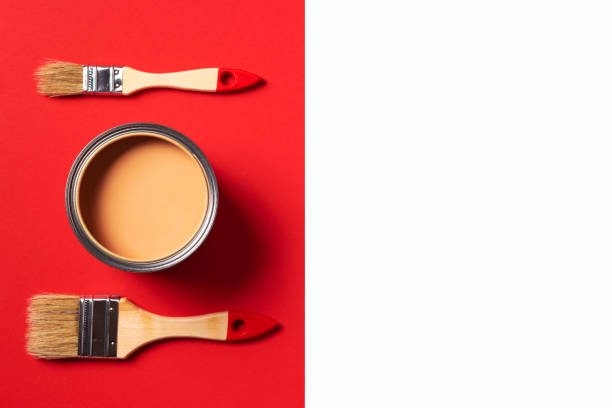 istock Wooden paint brushes, open paint can on trendy red and white background. Top view, copy space. Appartment renovation, repair, building and home design concept. 1180991183