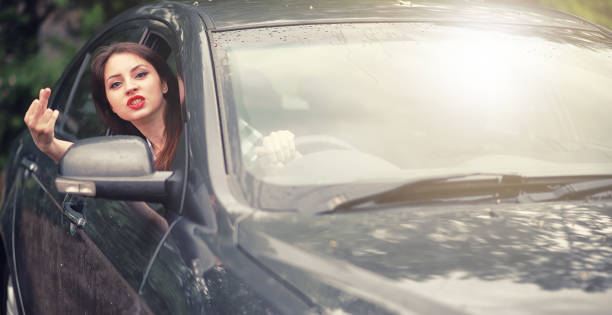 istock Girl driving a car bad emotions 1180991901
