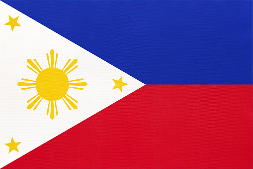 Philippine national fabric flag textile background. Symbol of international world Asian country. State official Philippines sign.