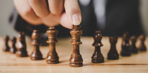 istock Panoramic image. Businessman with chess board game. Plan stratgy and tactic concept 1180995370