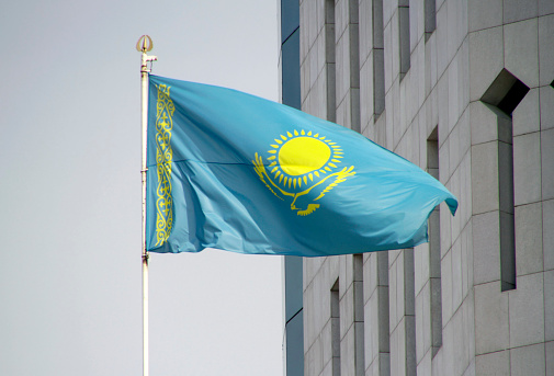 Kazakhstan national flag waving in the wind