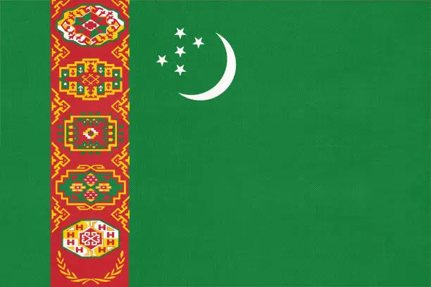 Photo of Turkmenistan national fabric flag textile background. Symbol of world Asian country