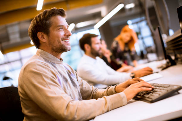 istock Young business people working in office 1180999758