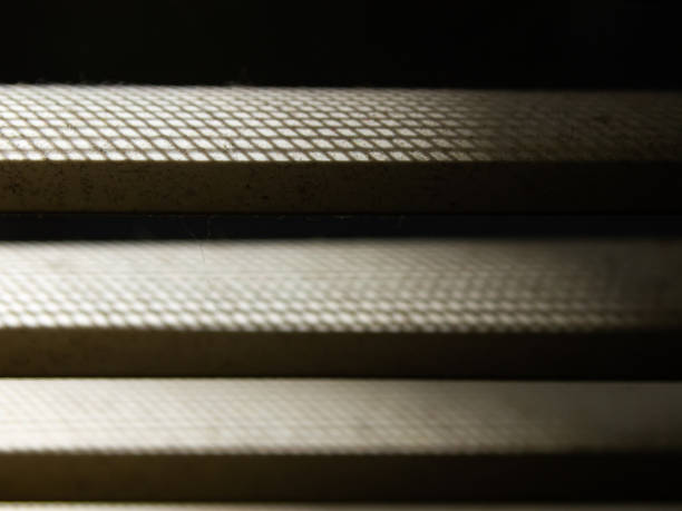istock Dust blinds inside a window, Dust and Dirty mosquito wire screen window, Light & Shadow shot, Close up and macro shot, Selective focus 1181000022
