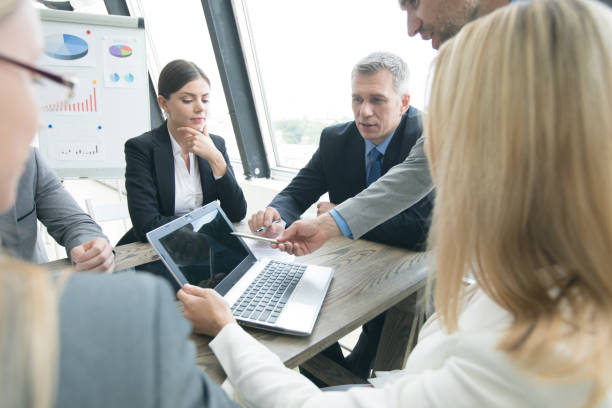 istock Business people at office meeting 1181001666