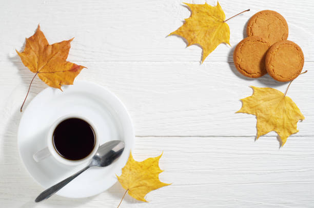 istock Coffee with oatmeal cookies and leaves 1181002808