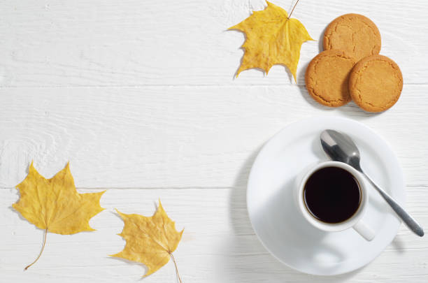 istock Coffee with oatmeal cookies and leaves 1181002934