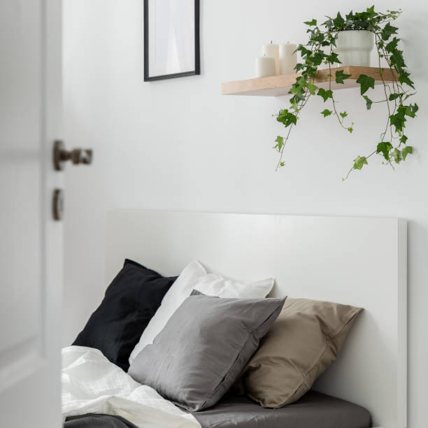 istock Bedroom with decorative cushions 1181004214