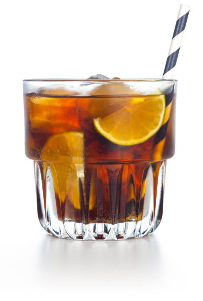 whiskey and cola cocktail on white
