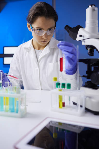 istock Female Scientist Holding Test Tube 1181006454