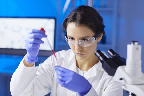 istock Young Woman Working in Laboratory 1181006476