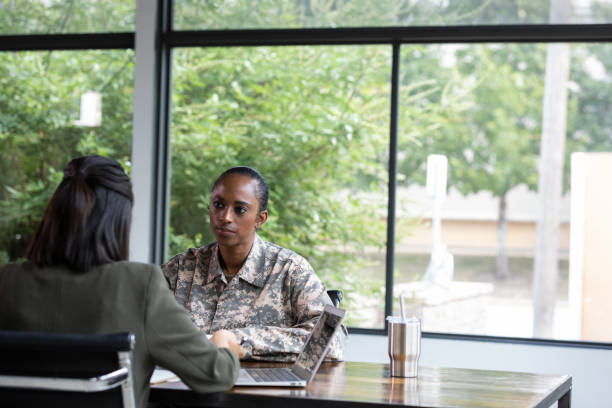istock Female veteran meets with counselor 1181008288