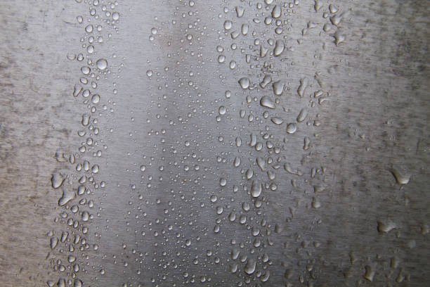 istock Raindrops detail on steel wall 1181010885