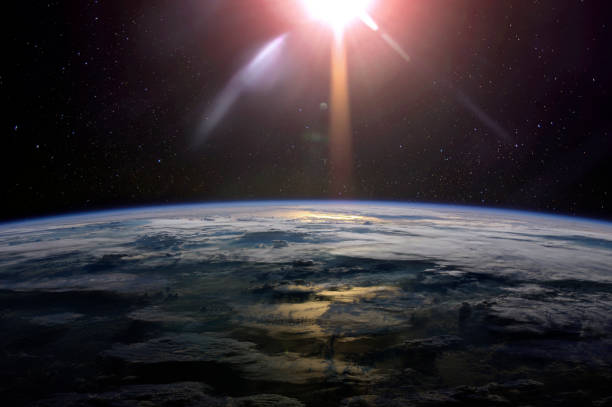 istock View of the planet Earth from space with clouds during a sunrise. Elements of this image furnished by NASA. 1181011105