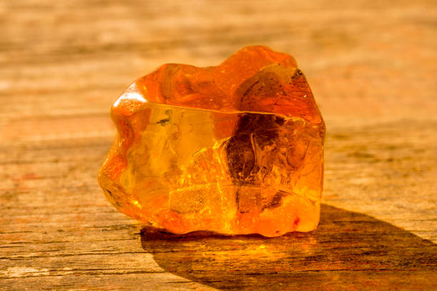 istock Amber in sun with inclusions 1181014651