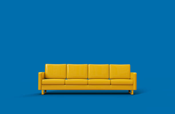 istock Yellow leather sofa isolated on blue background. 3d rendering 1181022248