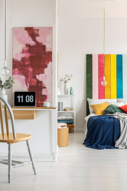 istock Open space bedroom and home office interior with bed and desk 1181026267