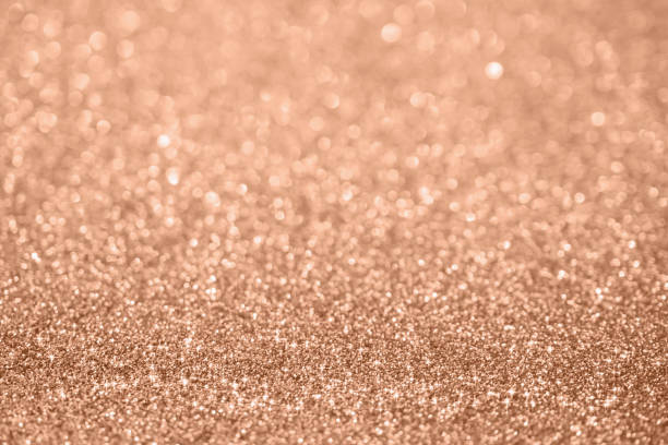 istock Abstract blur rose gold glitter sparkle defocused bokeh light background 1181030944