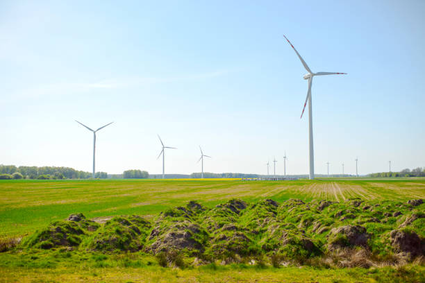 istock Bright blue sky moving and wind turbine 1181032277